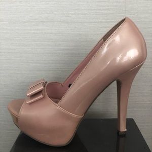 Patent blush coloured pump heels